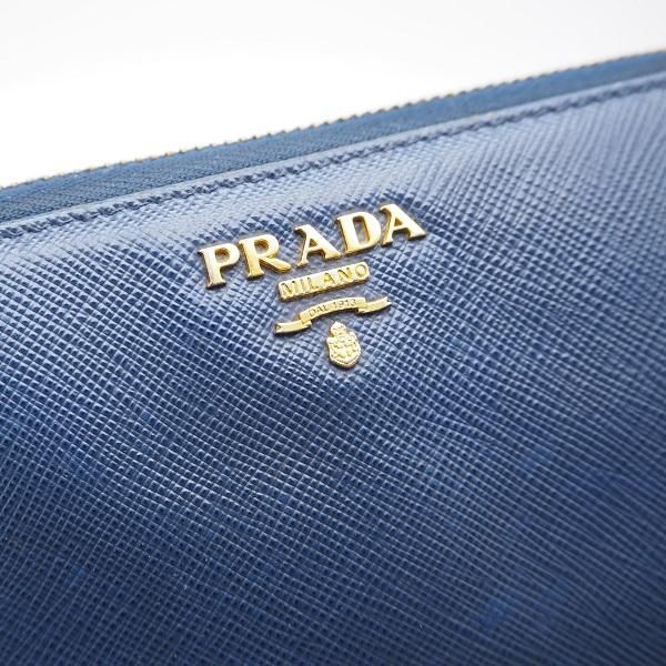 中古】PRADA（プラダ） SAFFIANO METAL ラウンドジップ 長財布 BLUETTE 1ML506 - 六本木  時計専門店PROUD(プラウド)