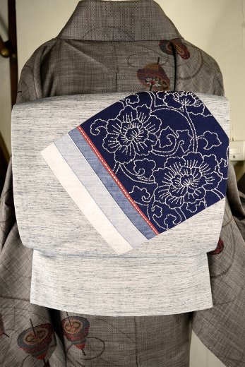 霞地に相良刺繍アラベスク切り嵌め美しい京袋帯